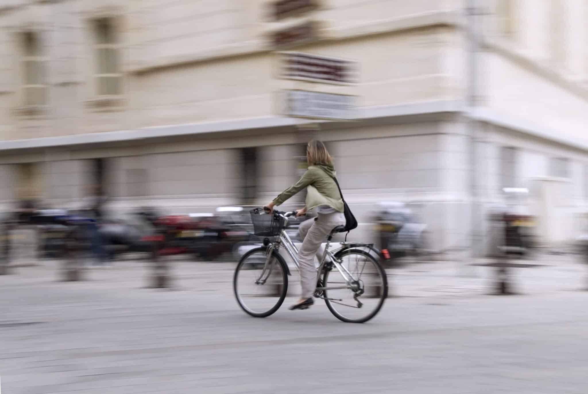 woman on a bike in the city